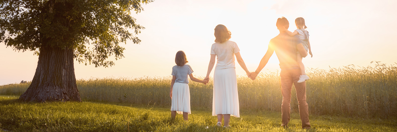 Family looking out into the sunset