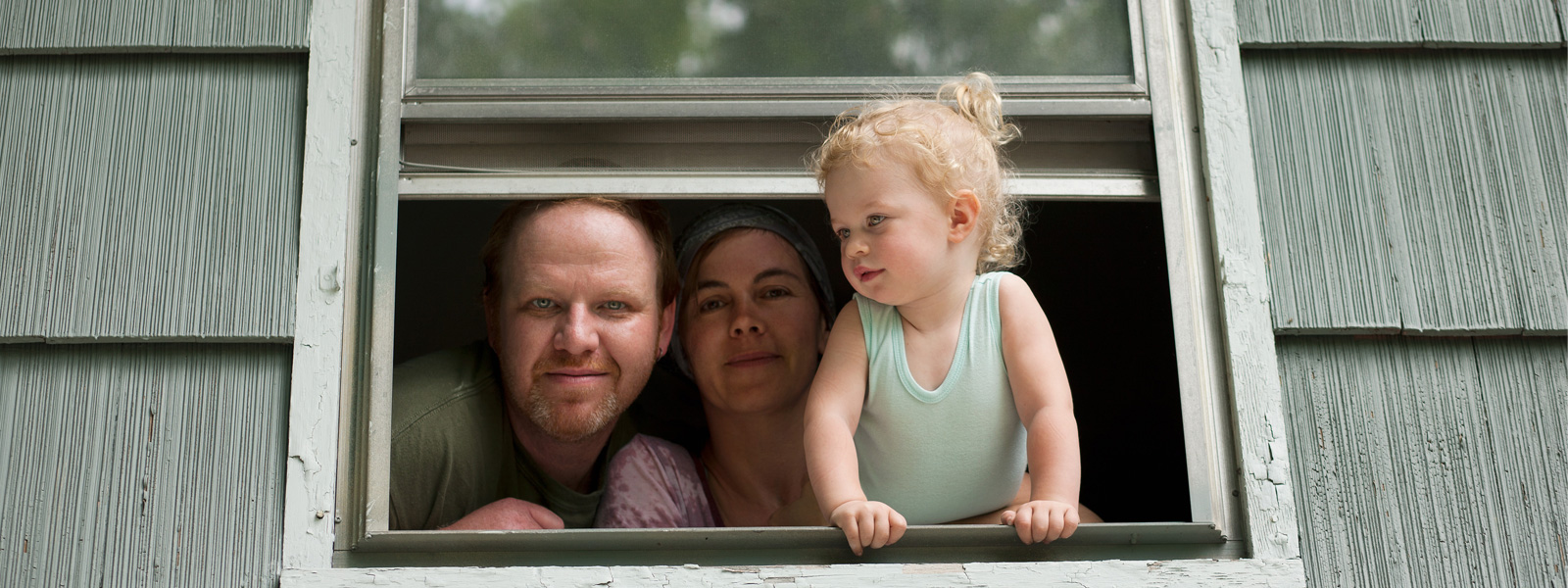 Family looking out window