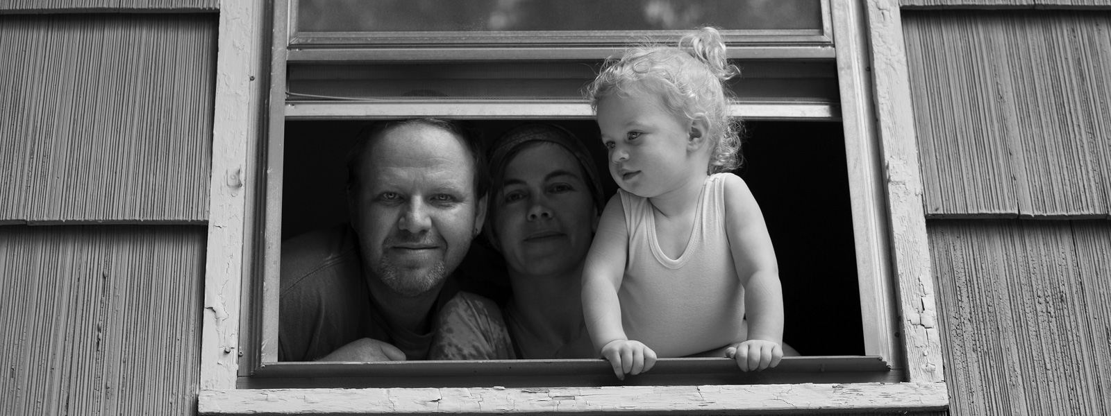Family looking out window